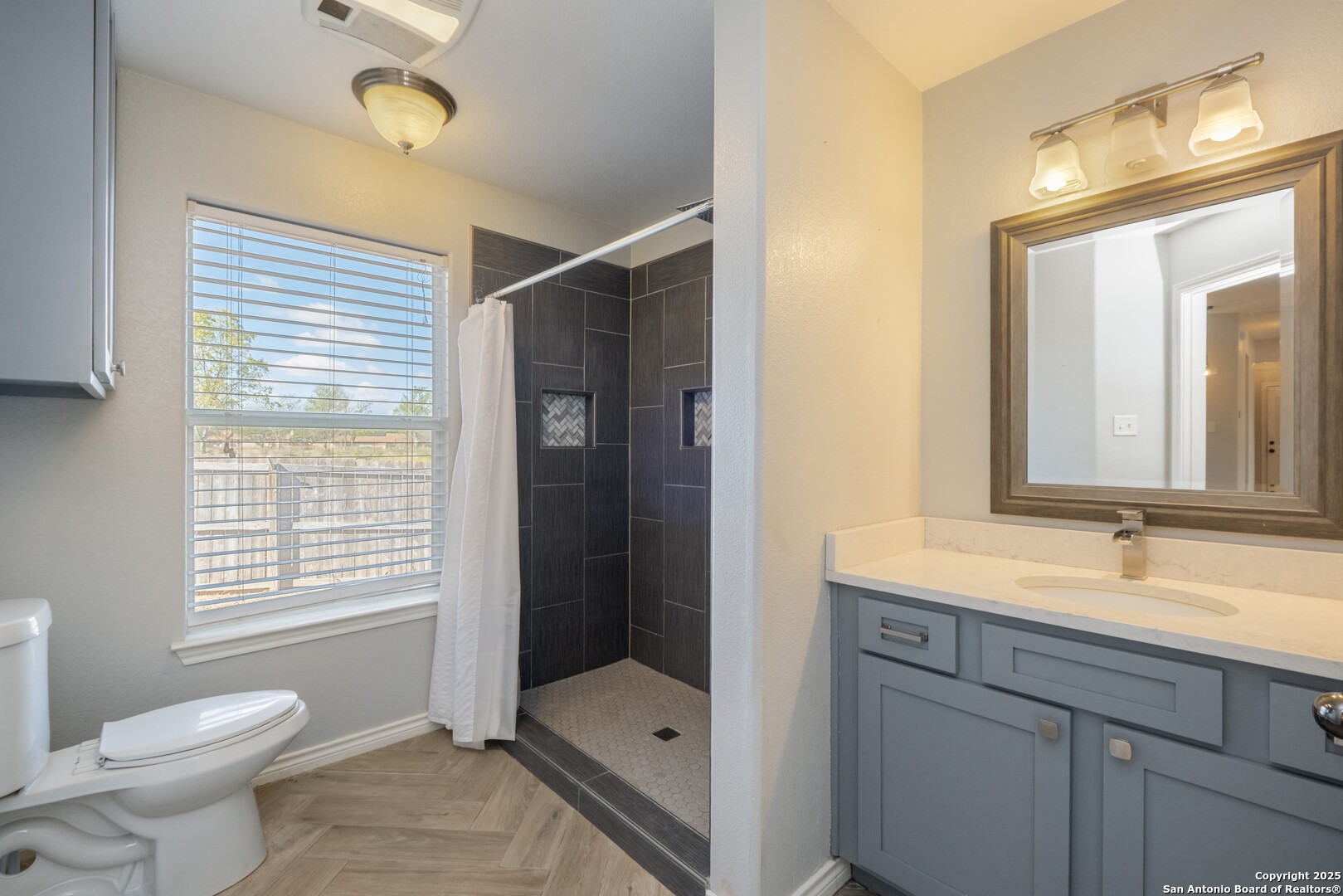 206 Club View West Seguin, TX 78155 - Photo 22 of 36 a bathroom with a sink and a mirror