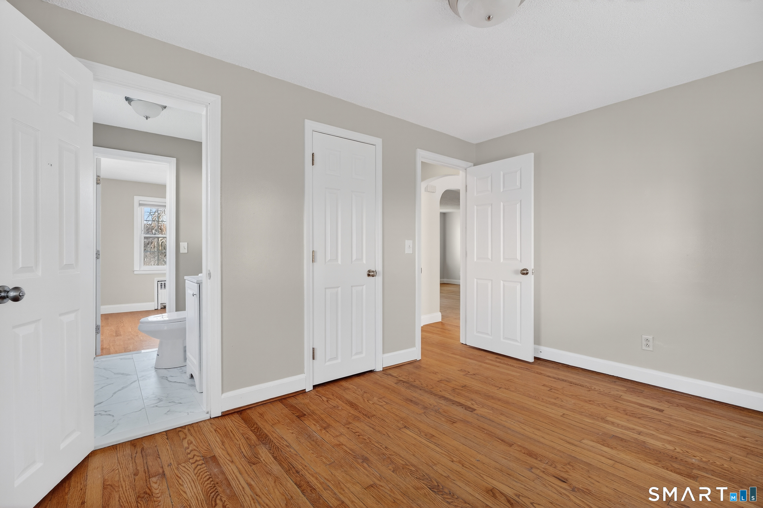 195 Middletown Avenue Wethersfield, CT 06109 - Photo 18 of 35 a view of empty room with wooden floor and fan