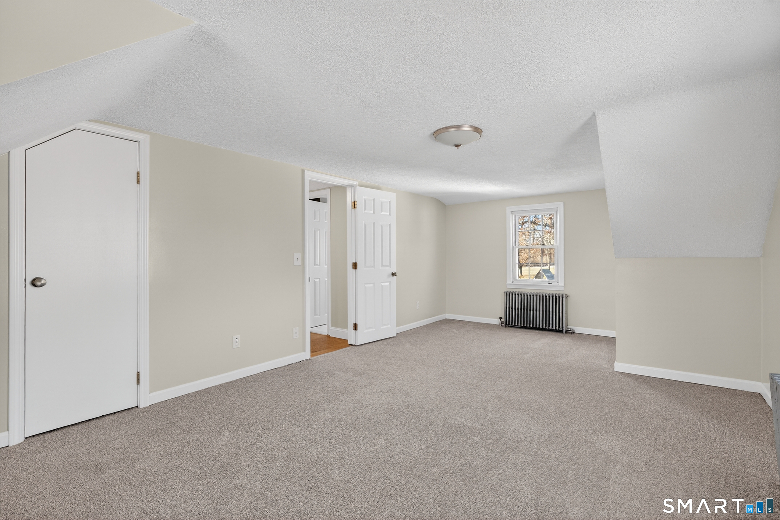 195 Middletown Avenue Wethersfield, CT 06109 - Photo 20 of 35 a view of an empty room with a window