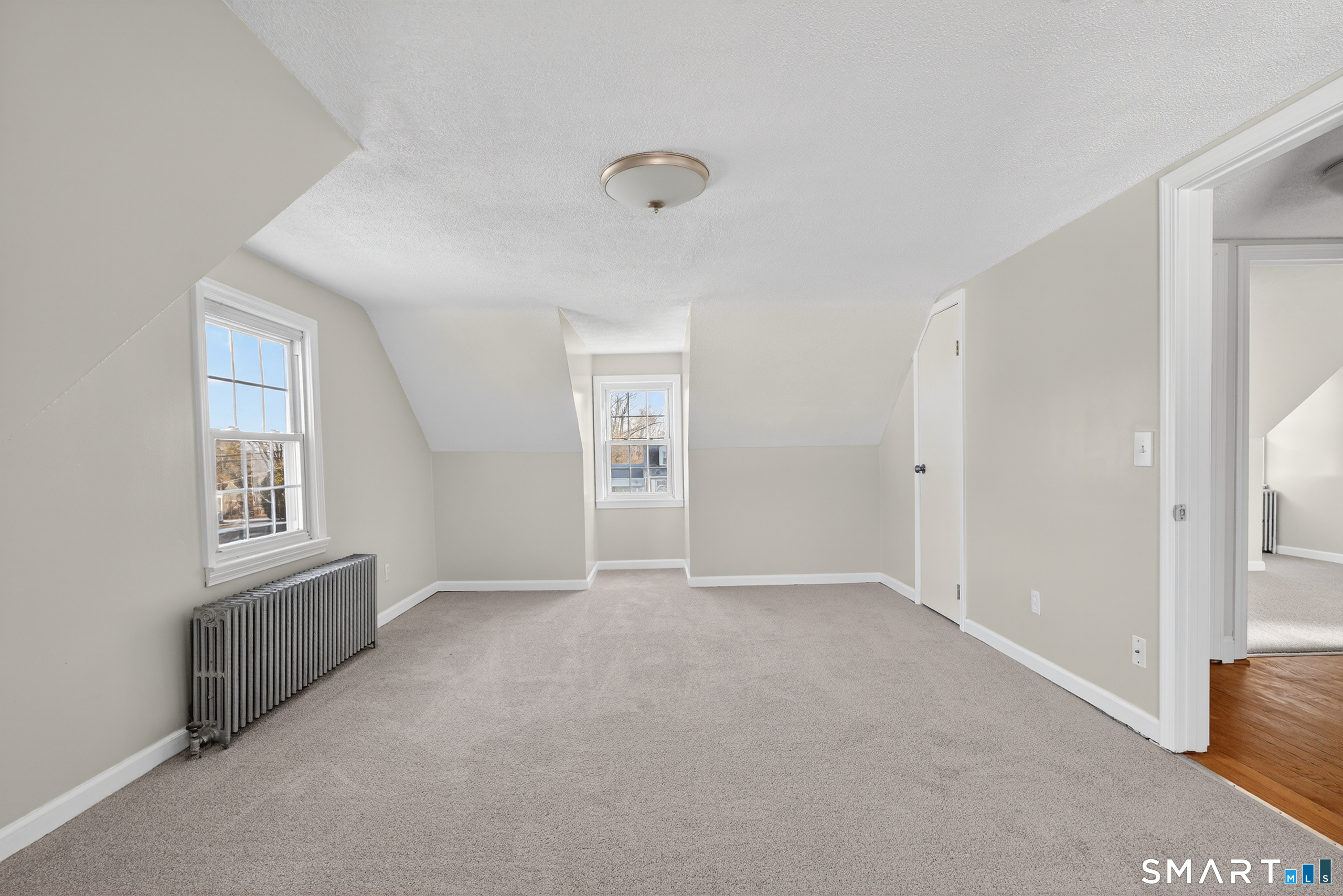 195 Middletown Avenue Wethersfield, CT 06109 - Photo 22 of 35 an empty room with windows
