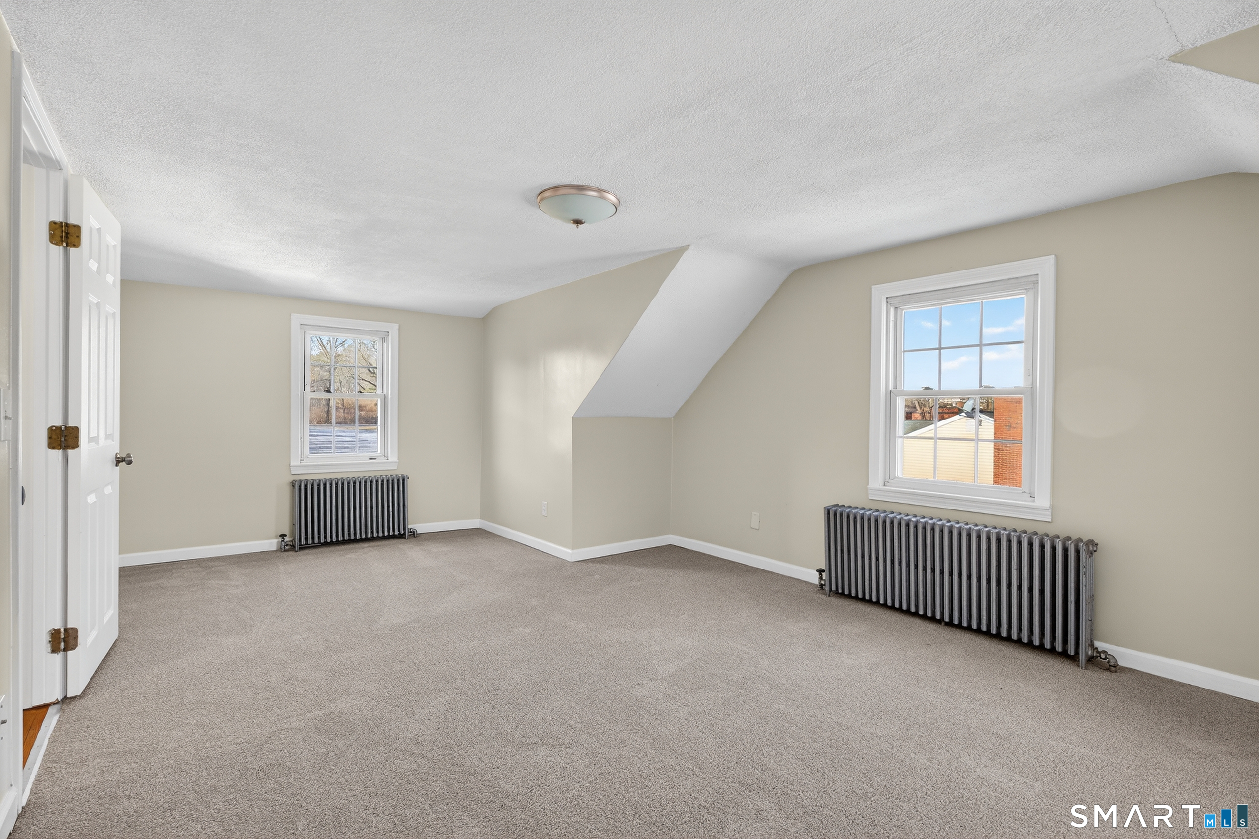 195 Middletown Avenue Wethersfield, CT 06109 - Photo 23 of 35 an empty room with windows