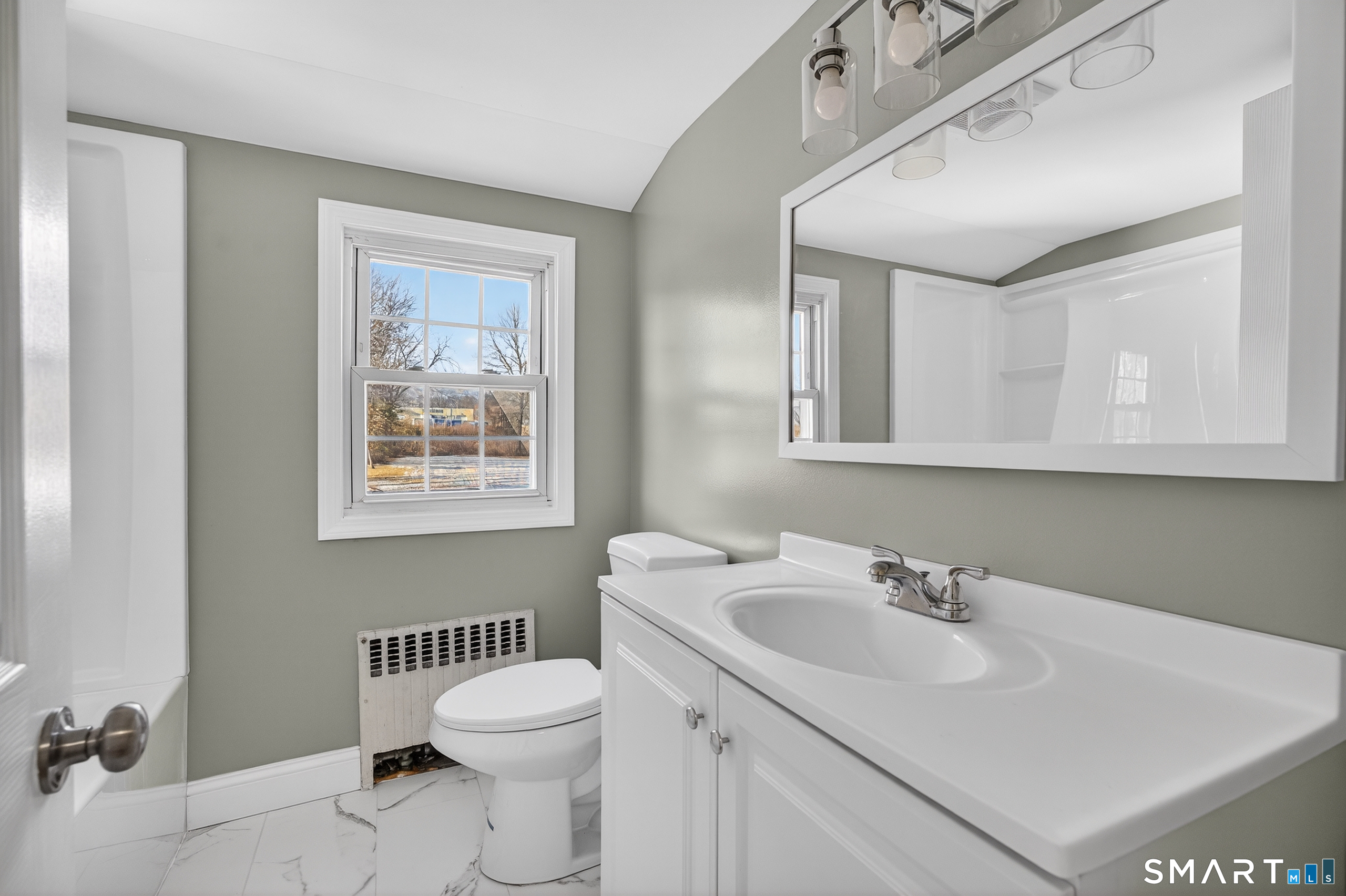 195 Middletown Avenue Wethersfield, CT 06109 - Photo 24 of 35 a bathroom with a sink a toilet and mirror
