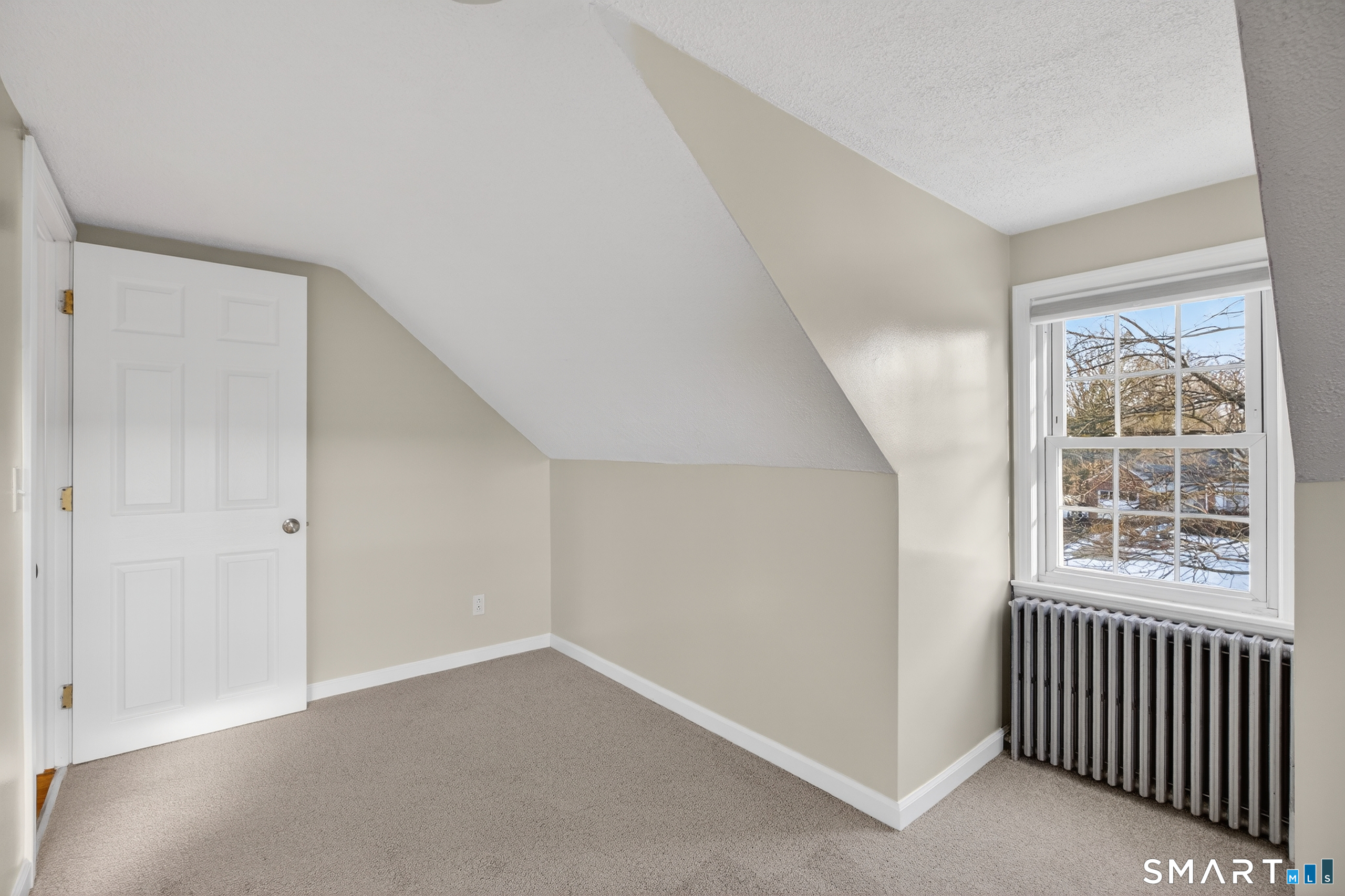 195 Middletown Avenue Wethersfield, CT 06109 - Photo 26 of 35 a view of an empty room with a window