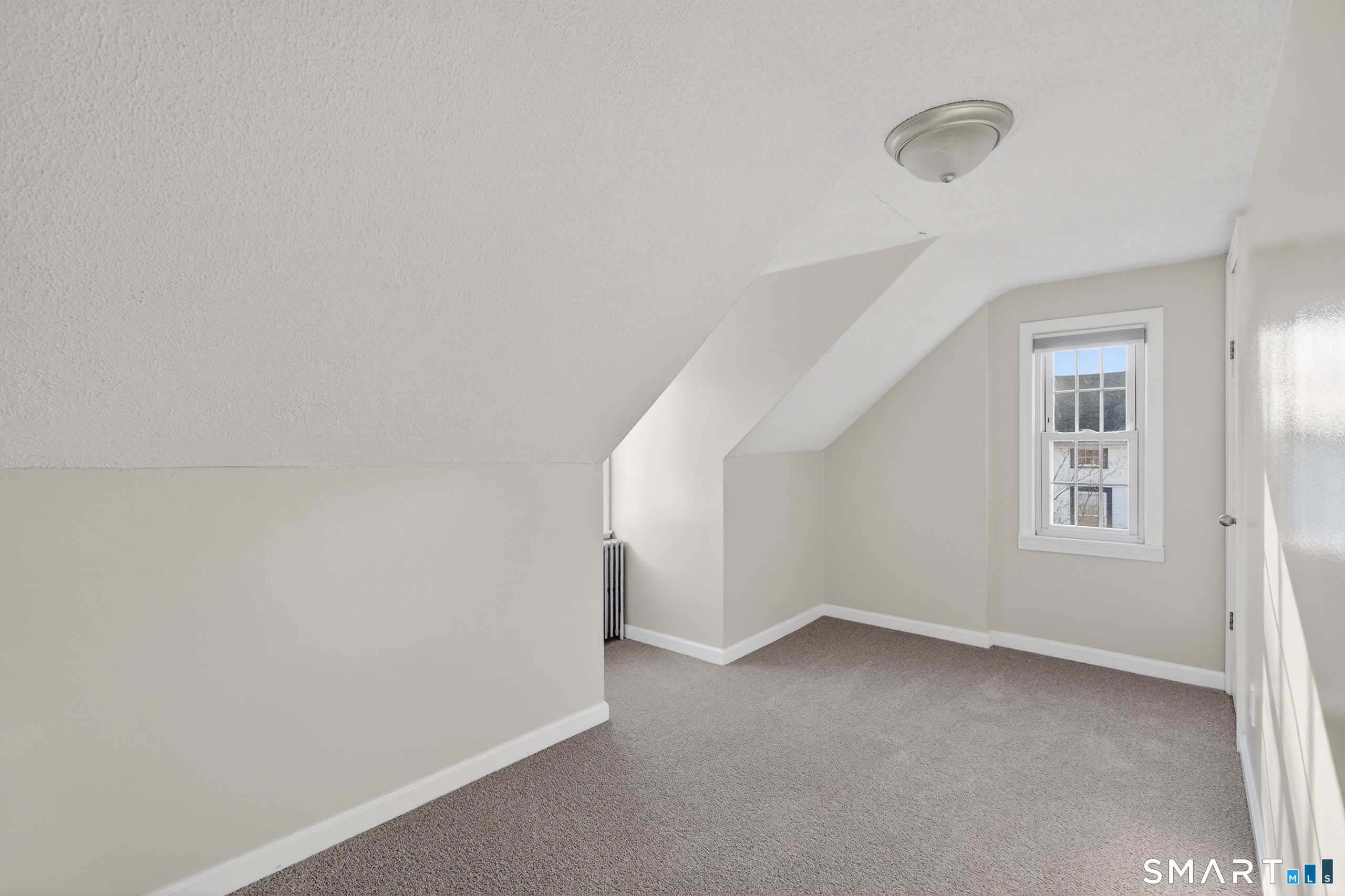195 Middletown Avenue Wethersfield, CT 06109 - Photo 27 of 35 a view of an empty room with a window