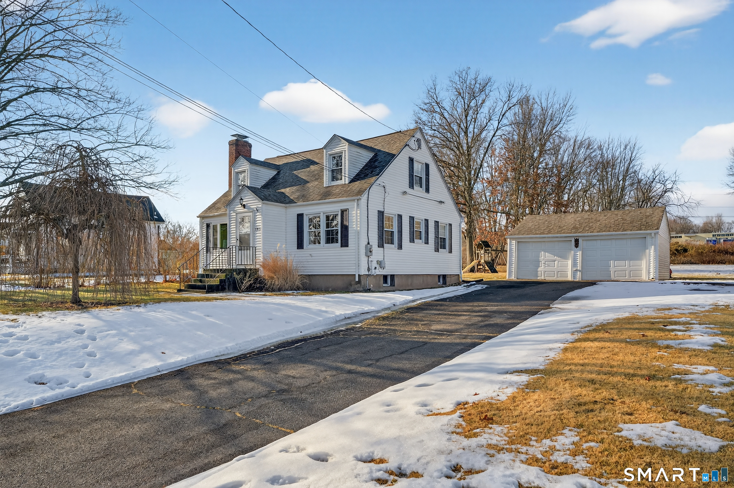 195 Middletown Avenue Wethersfield, CT 06109 - Photo 32 of 35 a view of a white house with a large road next to a road