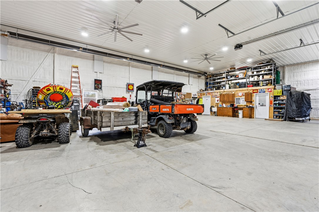 1158 Pyle Road Clarksville, OH 45113 - Photo 62 of 76 This spacious shop offers abundant room for vehicles and equipment, featuring ample storage and sturdy concrete flooring.