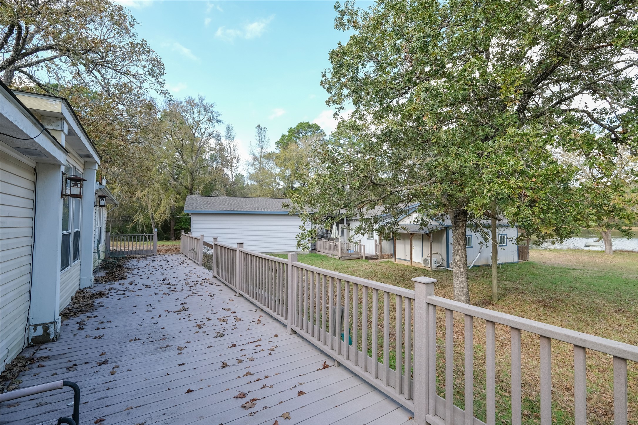 170 W Creek Trinity, TX 75862 - Photo 40 of 48 a view of a wooden fence and trees around