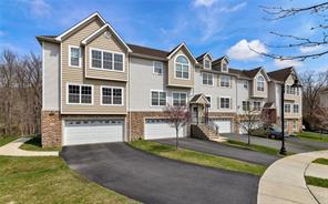 42 Peter Turner Road, Unit 21 Monroe, NY 10950 - Photo 1 of 1 a front view of a house with a yard