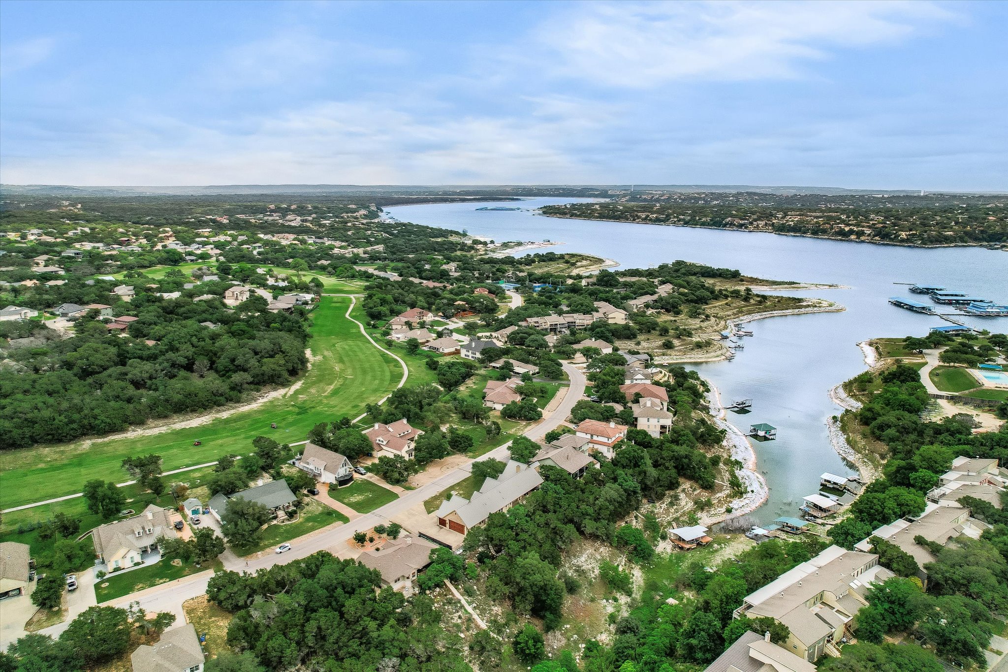 409 Venture Boulevard South Point Venture, TX 78645 - Photo 3 of 37 Nestled between golf and Lake Travis