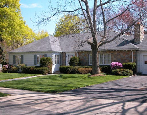 142 Gordon Road Newton, MA 02468 - Photo 1 of 1 a front view of a house with a garden and yard