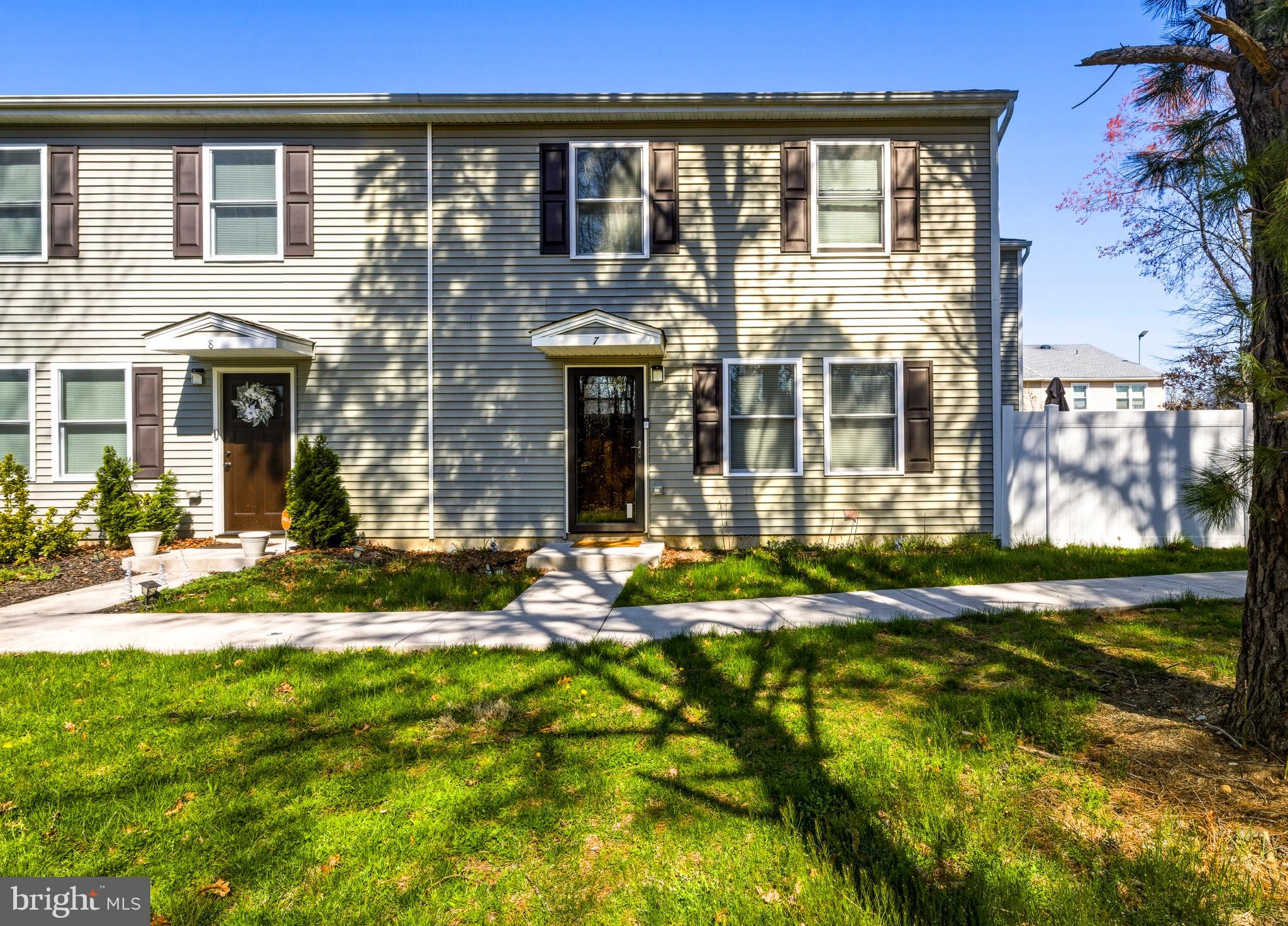 7 Lyons Court Sicklerville, NJ 08081 - Photo 1 of 11 a front view of a house with a yard