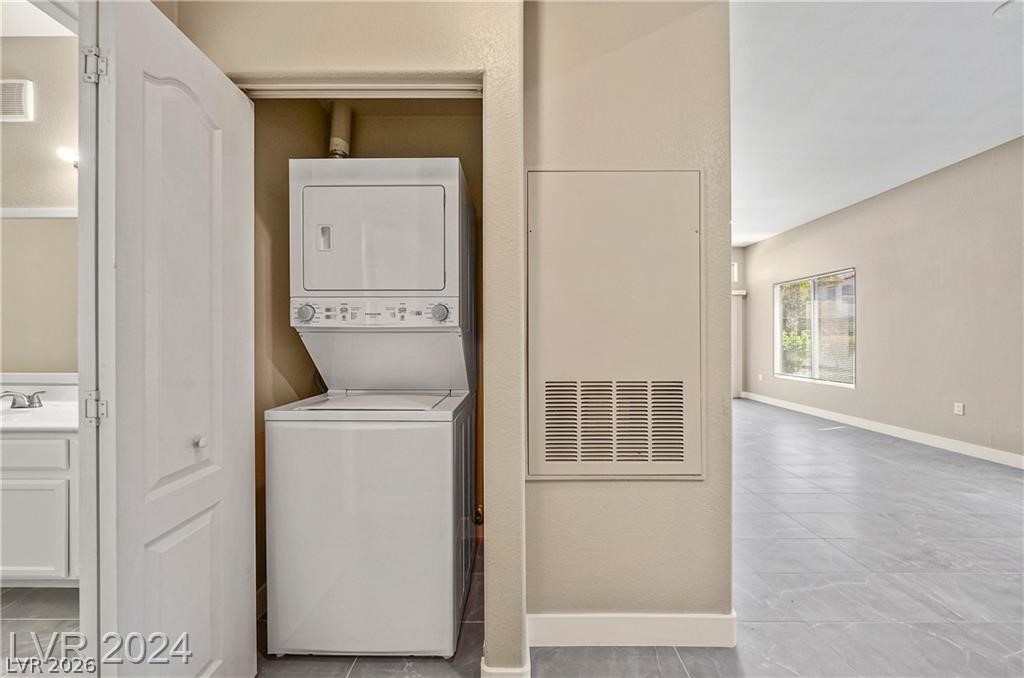 2305 West Horizon Ridge Parkway, Unit 1411 Henderson, NV 89052 - Photo 13 of 17 This dedicated laundry space offers convenience and seamless integration within the home's design.