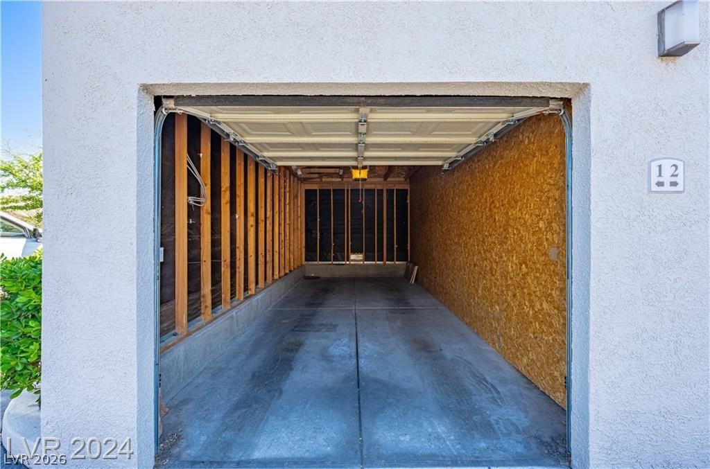 2305 West Horizon Ridge Parkway, Unit 1411 Henderson, NV 89052 - Photo 17 of 17 This spacious garage offers ample room for vehicles and additional storage.