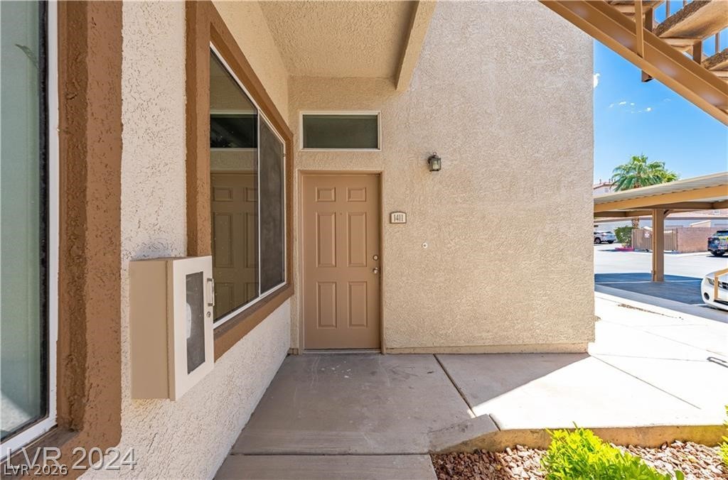 2305 West Horizon Ridge Parkway, Unit 1411 Henderson, NV 89052 - Photo 2 of 17 This inviting entrance features a sturdy door and easy access, leading to comfortable living.