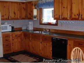 1305 Schoolhouse Road Hop Bottom, PA 18824 - Photo 2 of 3 a kitchen with sink and cabinets