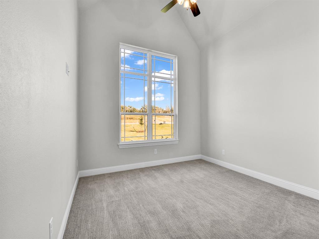 3009 Codigo Drive Weatherford, TX 76088 - Photo 25 of 40 an empty room with windows and closet