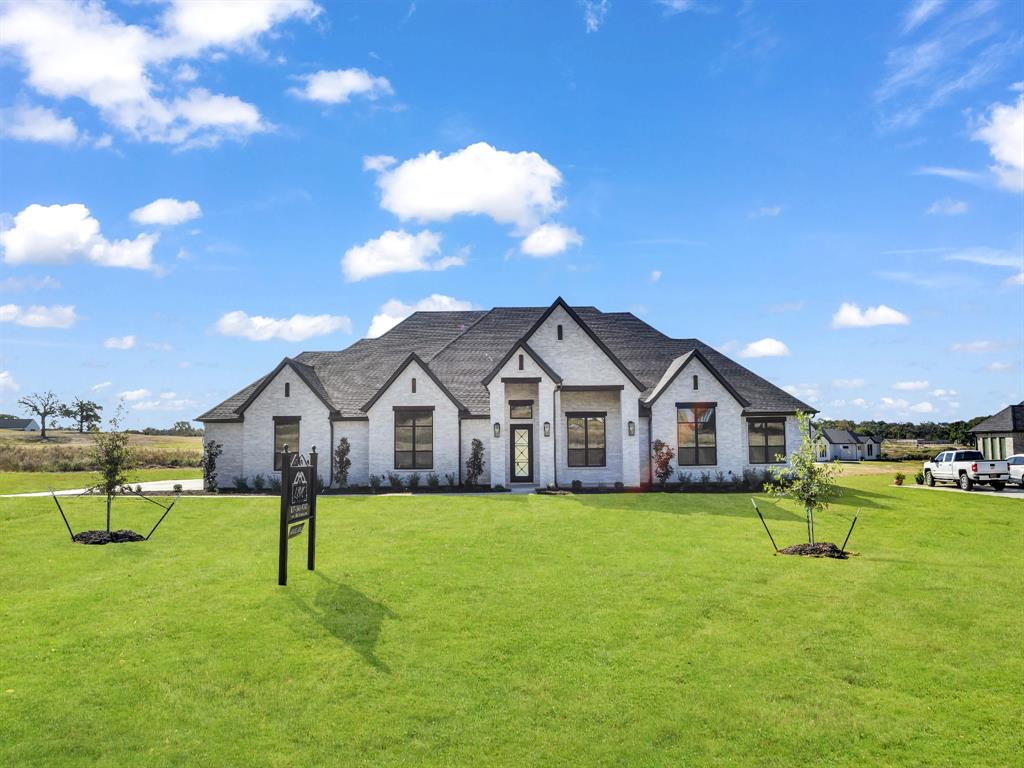 3009 Codigo Drive Weatherford, TX 76088 - Photo 3 of 40 a view of a house with a yard