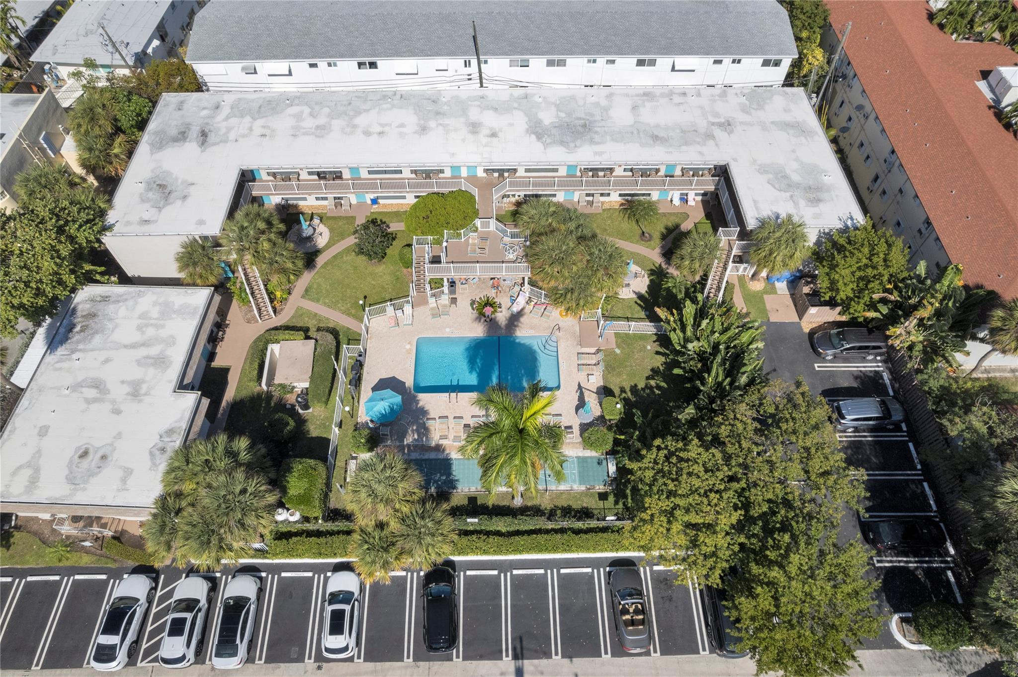 3225 Northeast 16th Street, Unit 10 Pompano Beach, FL 33062 - Photo 3 of 22 an aerial view of multiple houses with yard