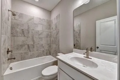 a bathroom with a sink toilet bathtub and shower