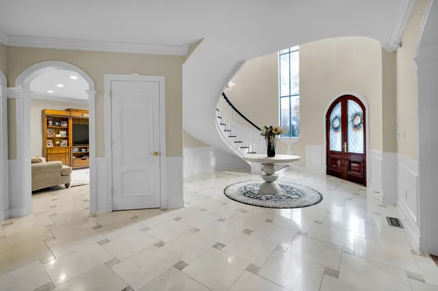 a view of a livingroom with a kitchen