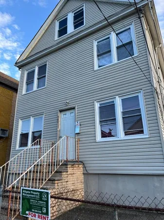 a front view of a house with a porch