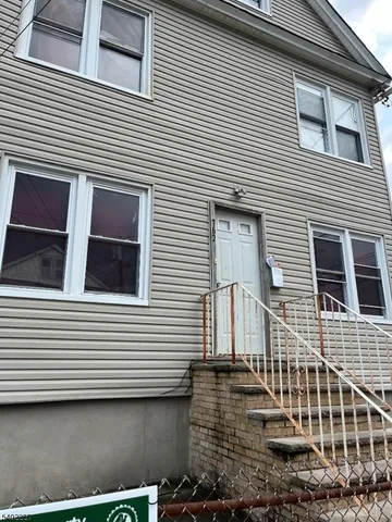 a view of a house with white door