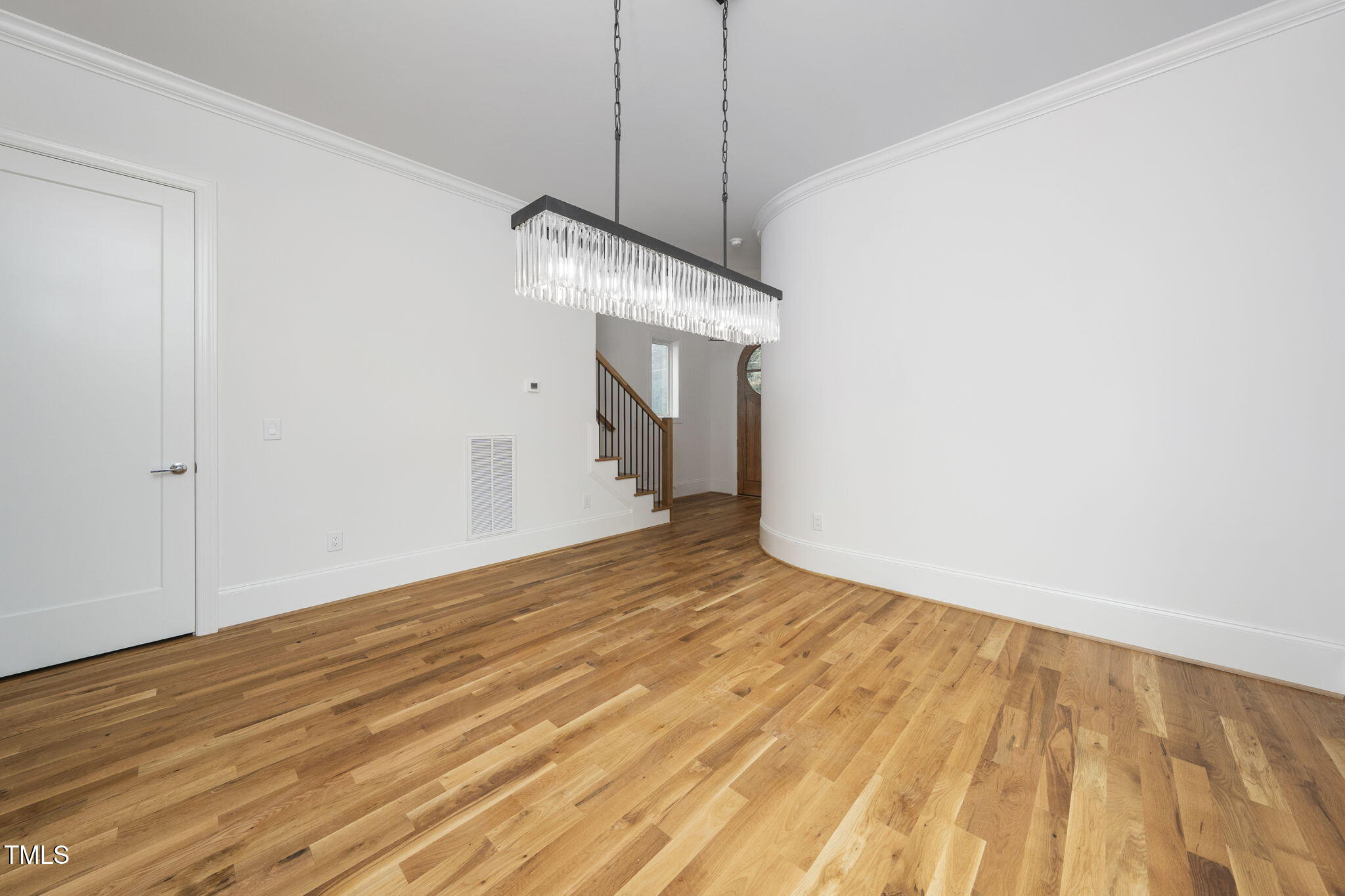 1332 Duplin Road Raleigh, NC 27607 - Photo 13 of 50 a view of empty room with wooden floor