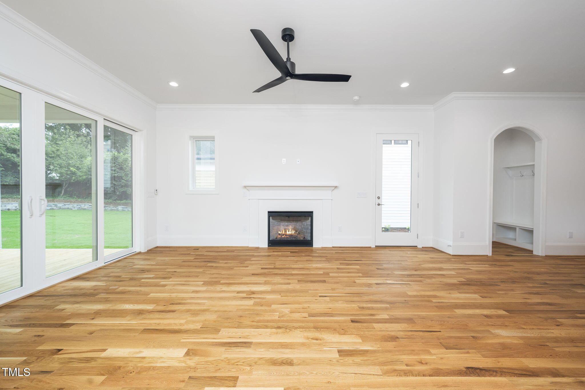 1332 Duplin Road Raleigh, NC 27607 - Photo 26 of 50 a view of empty room with window and fireplace