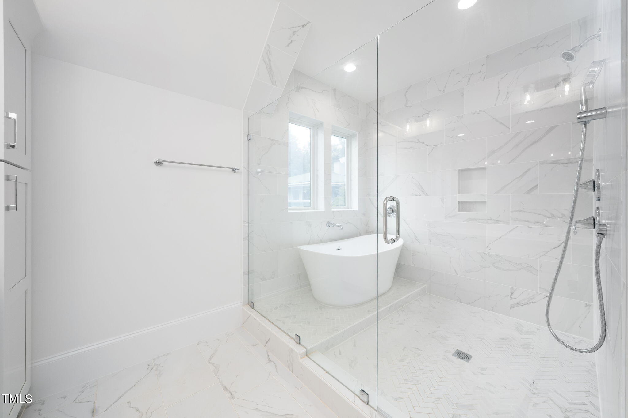 1332 Duplin Road Raleigh, NC 27607 - Photo 37 of 50 a bathroom with a bathtub and shower