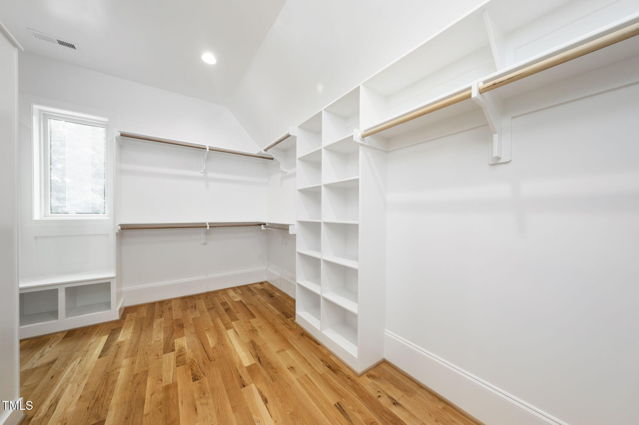 1332 Duplin Road Raleigh, NC 27607 - Photo 42 of 50 a view of a room with wooden floor and white walls