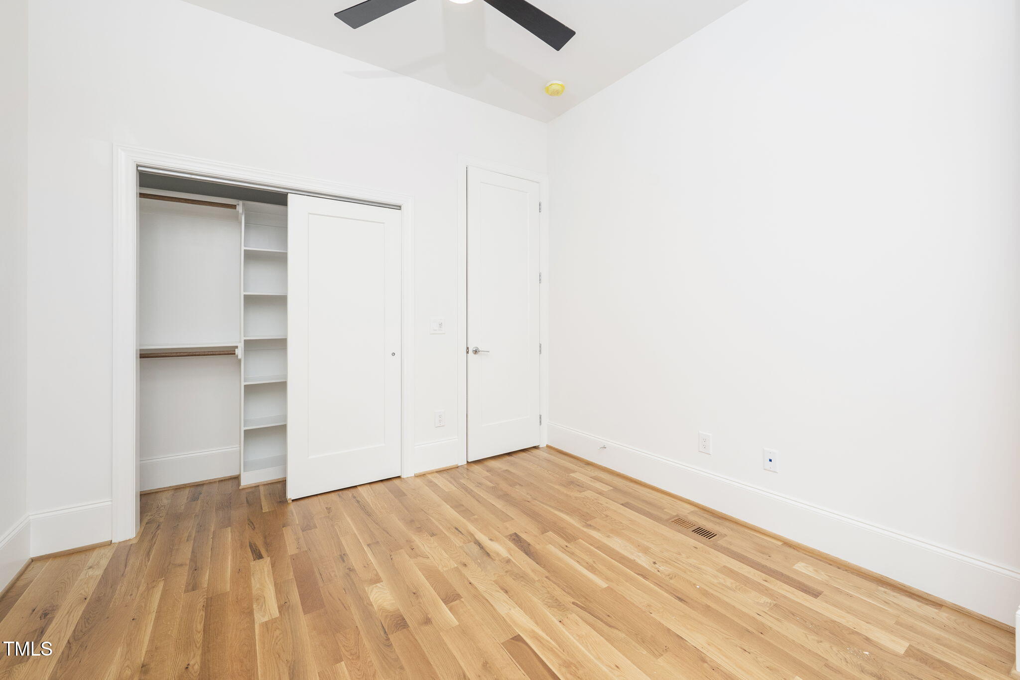 1332 Duplin Road Raleigh, NC 27607 - Photo 10 of 50 a view of empty room with wooden floor
