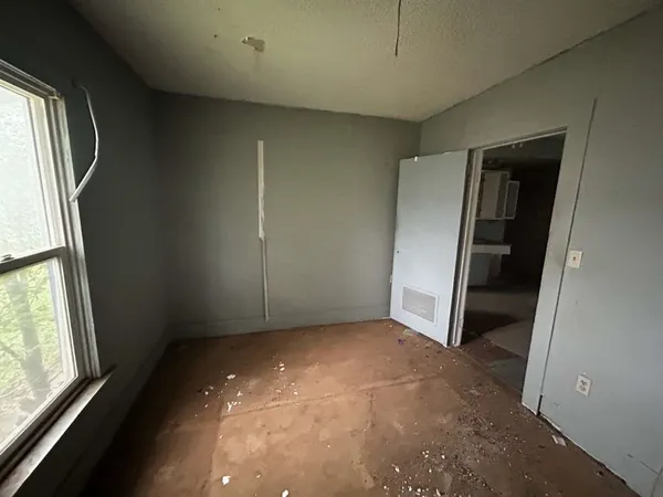 an empty room with windows