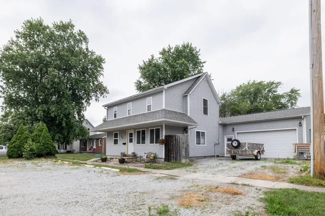 a view of a yard in front of a house