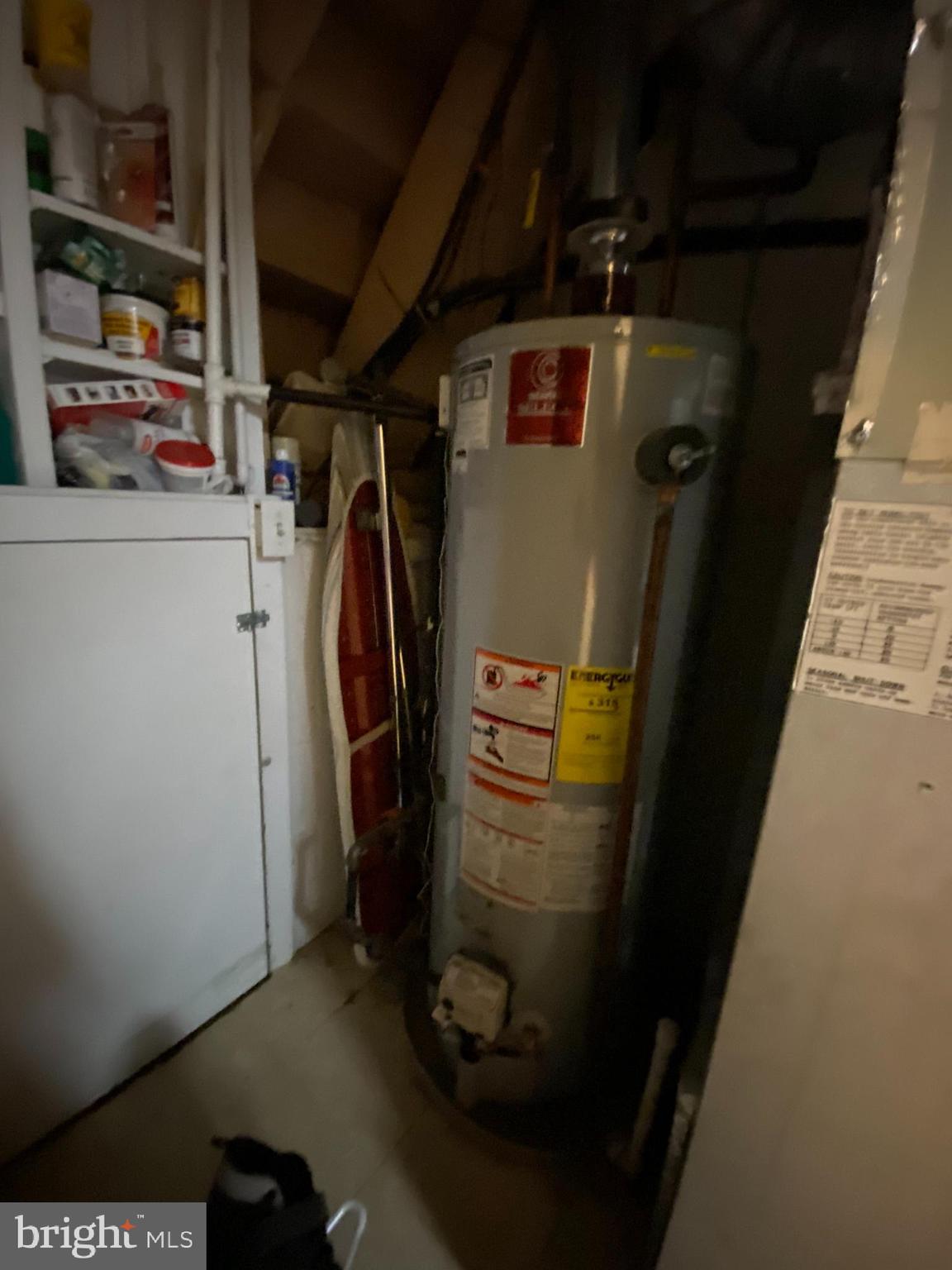 10920 Decatur Drive Fairfax, VA 22030 - Photo 17 of 32 Water heater & door to crawl space