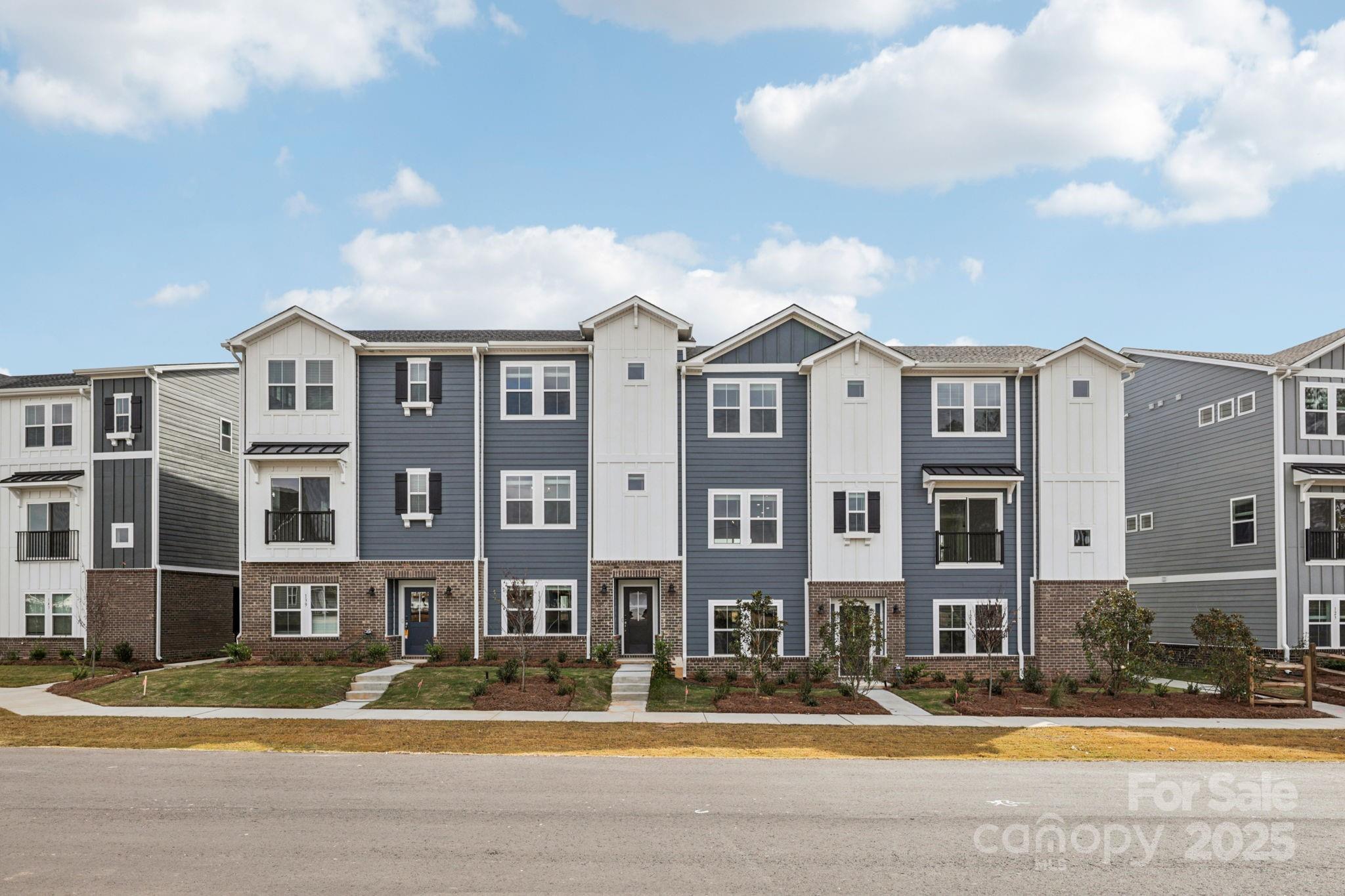 a front view of a building with street view