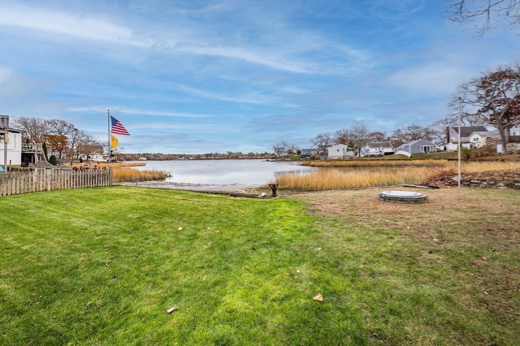 4 Ross Avenue Wareham, MA 02571 - Photo 22 of 39 a view of a lake with houses in the back