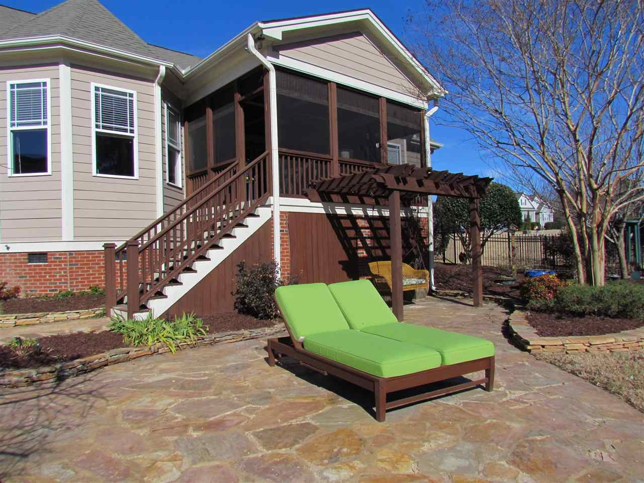 9101 Islamorada Lane Raleigh, NC 27603 - Photo 23 of 25 Flagstone Patio and screened in porch