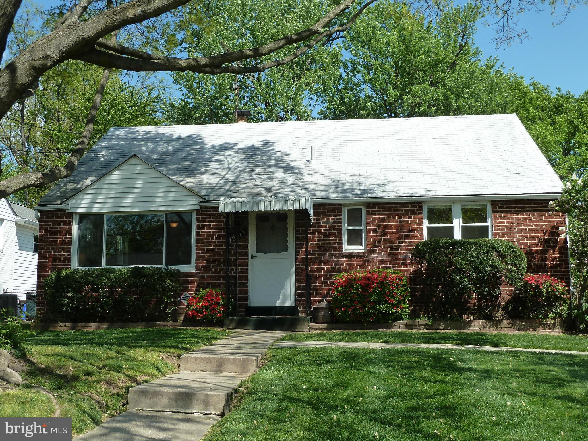 12613 Epping Road Silver Spring, MD 20906 - Photo 1 of 29 a house with a yard in front of it