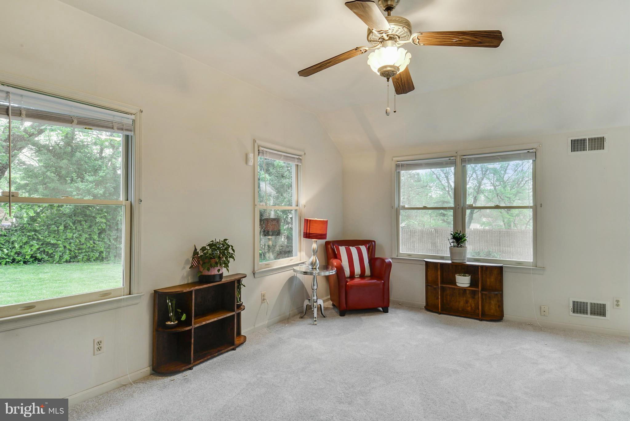 12613 Epping Road Silver Spring, MD 20906 - Photo 13 of 29 a bed room with furniture and a window