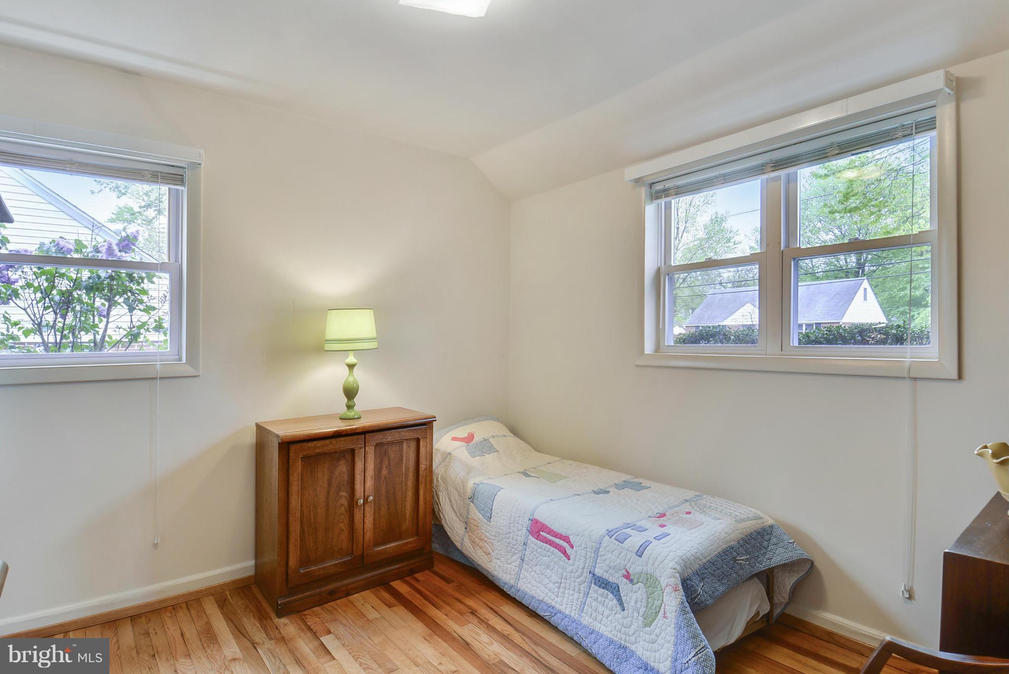 12613 Epping Road Silver Spring, MD 20906 - Photo 20 of 29 a bedroom with a bed and a window