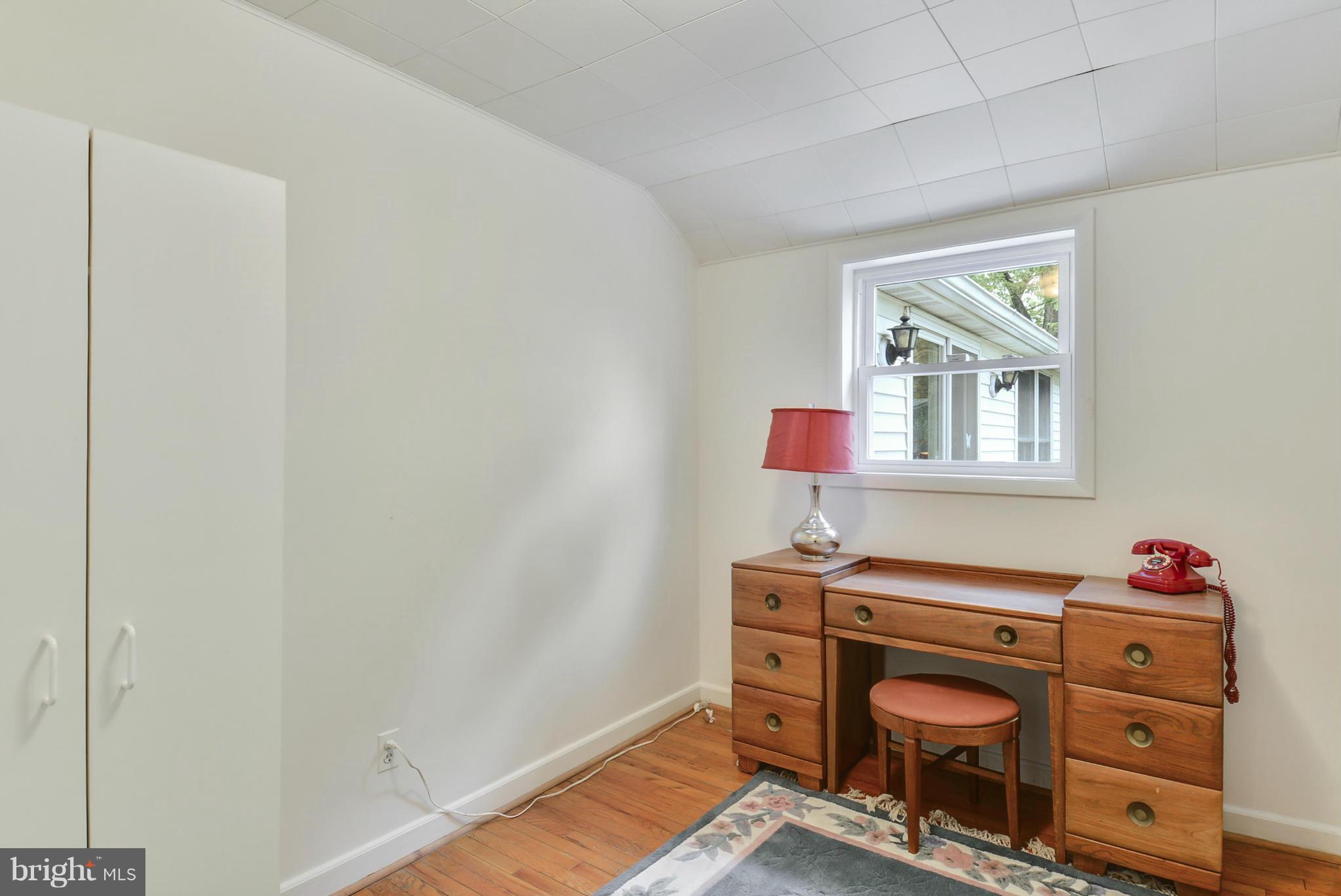 12613 Epping Road Silver Spring, MD 20906 - Photo 23 of 29 a room that has a dresser in it