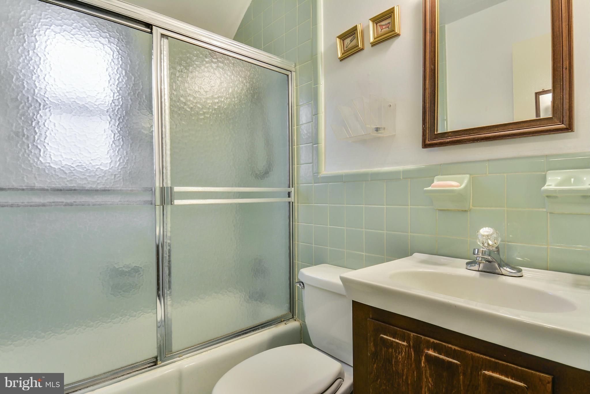 12613 Epping Road Silver Spring, MD 20906 - Photo 24 of 29 a bathroom with a sink toilet and shower