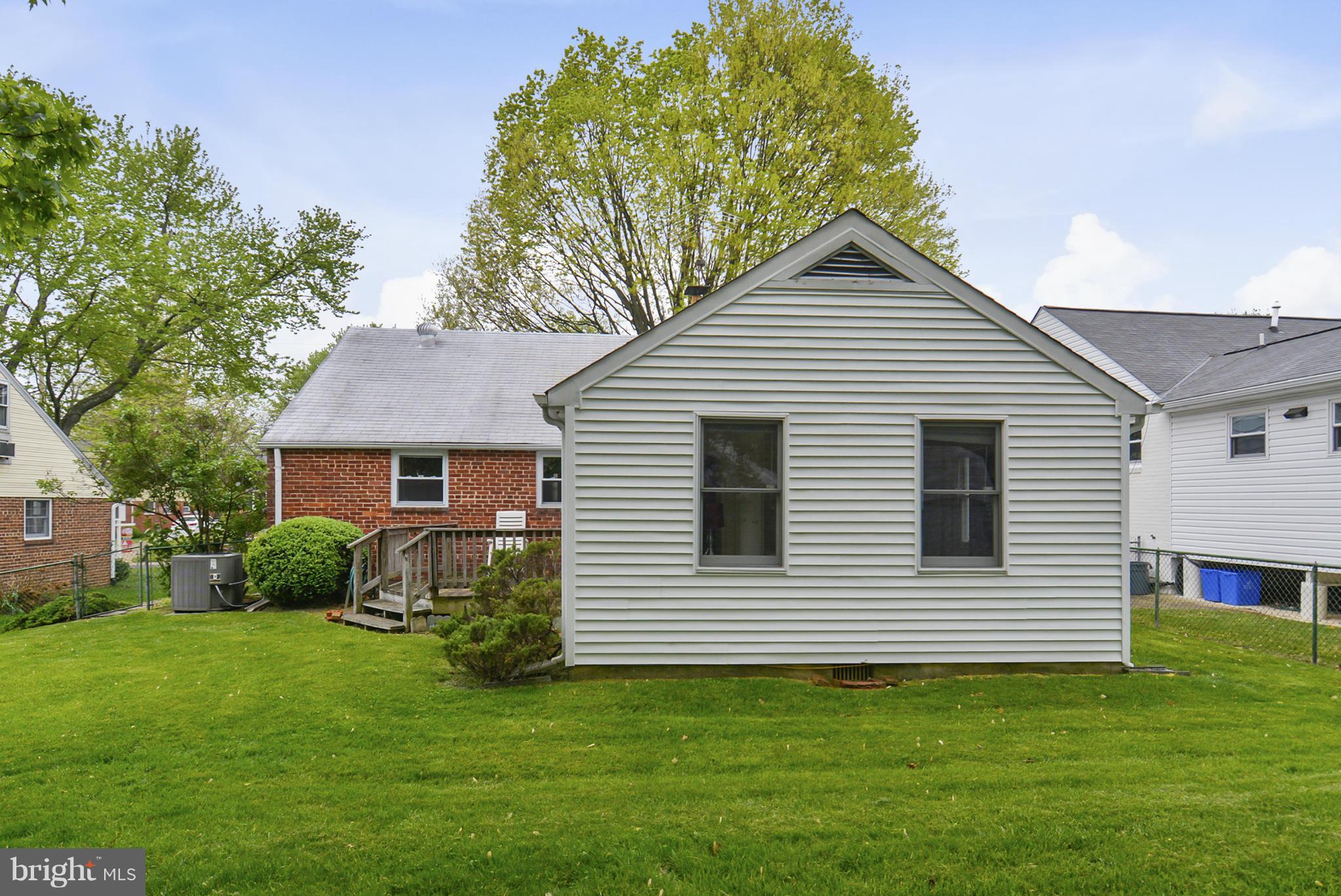 12613 Epping Road Silver Spring, MD 20906 - Photo 27 of 29 a view of a house with a yard