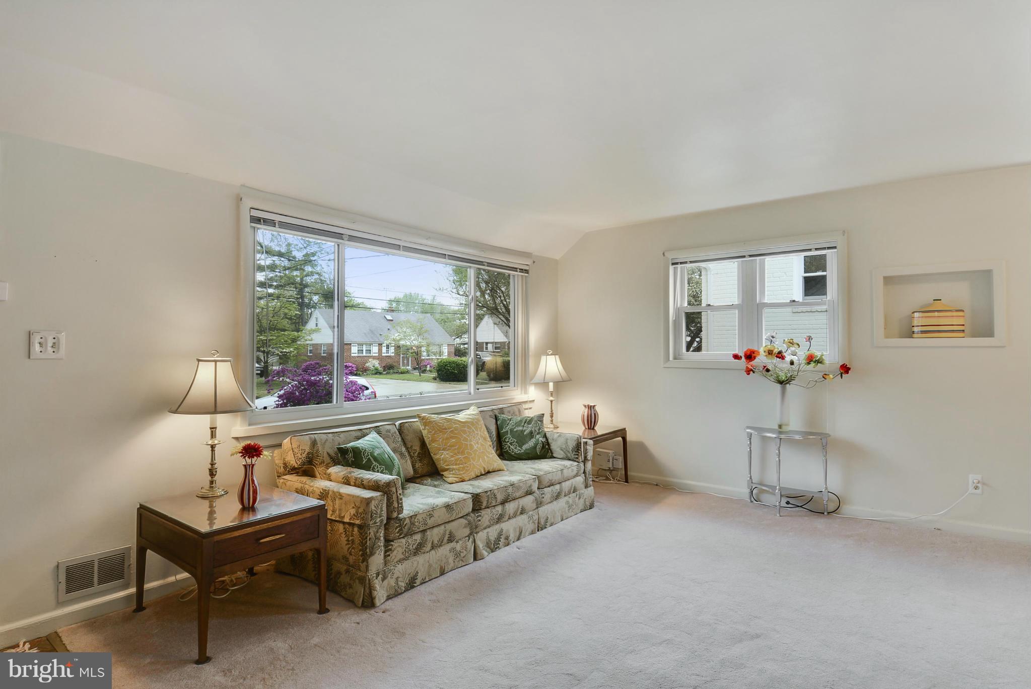 12613 Epping Road Silver Spring, MD 20906 - Photo 4 of 29 a living room with furniture and a large window