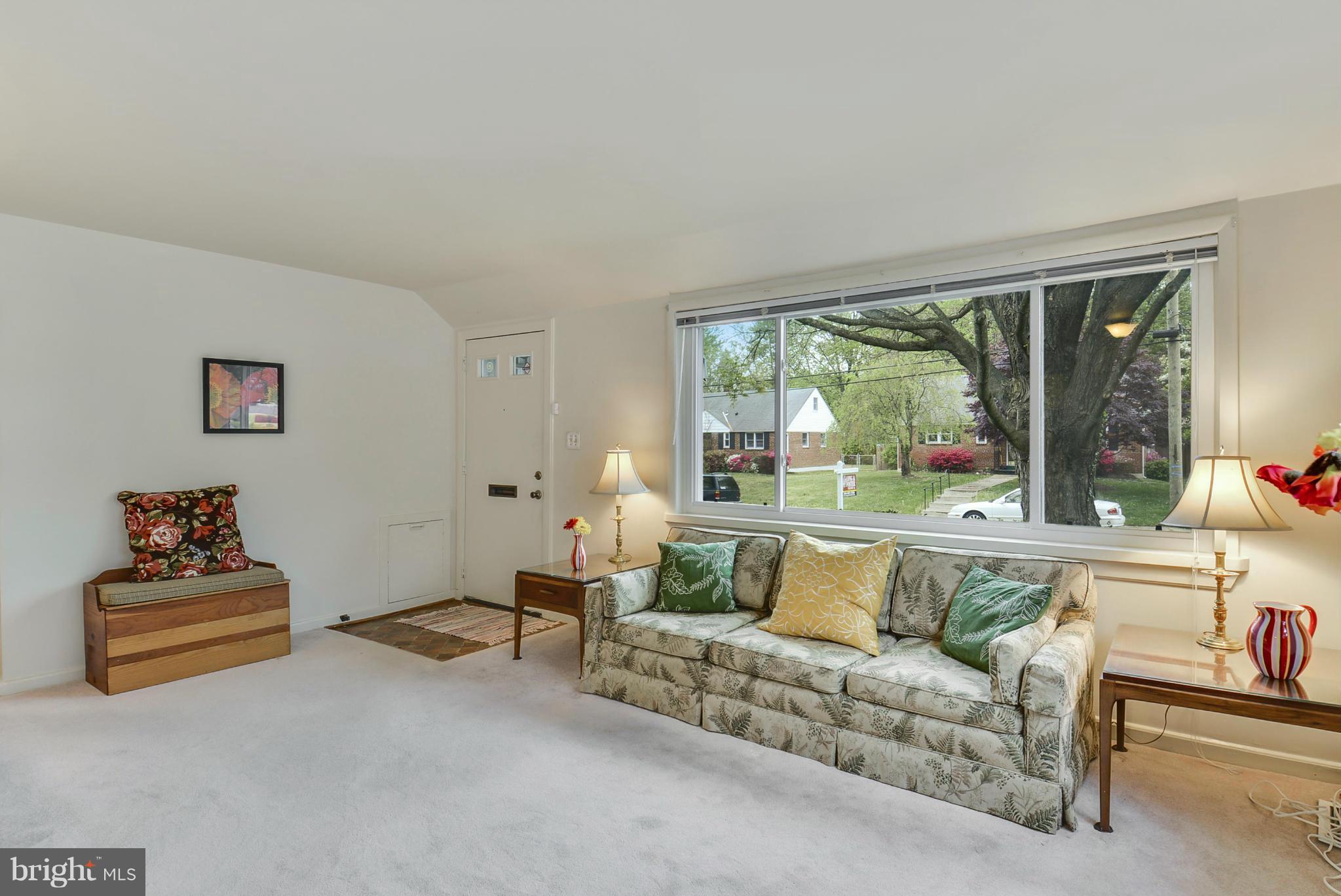 12613 Epping Road Silver Spring, MD 20906 - Photo 7 of 29 a living room with furniture and a large window