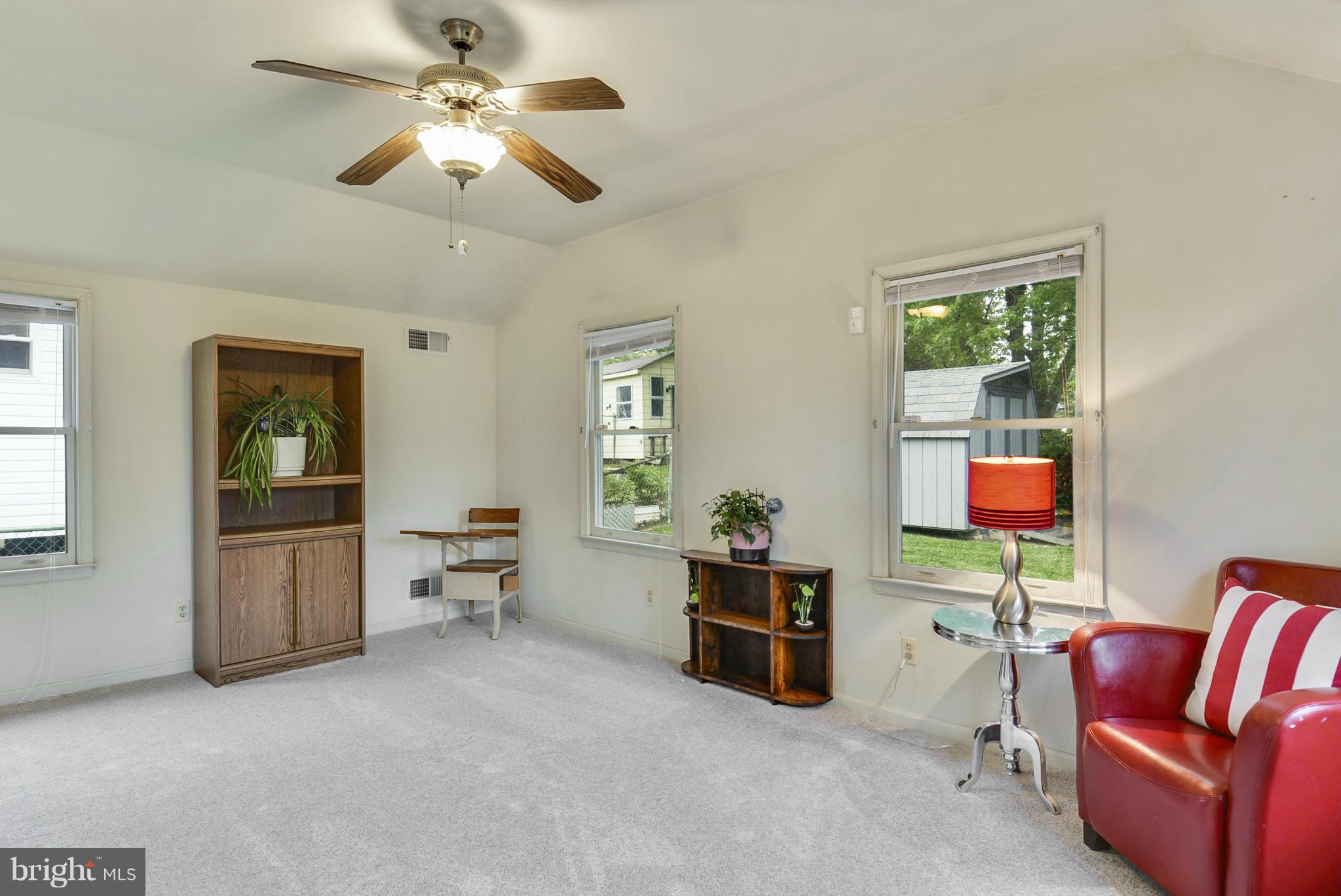 12613 Epping Road Silver Spring, MD 20906 - Photo 10 of 29 a living room with furniture and a window