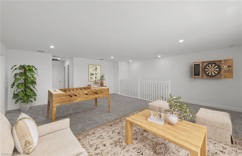 15629 Northridge Road Punta Gorda, FL 33982 - Photo 15 of 26 a living room with furniture and a rug