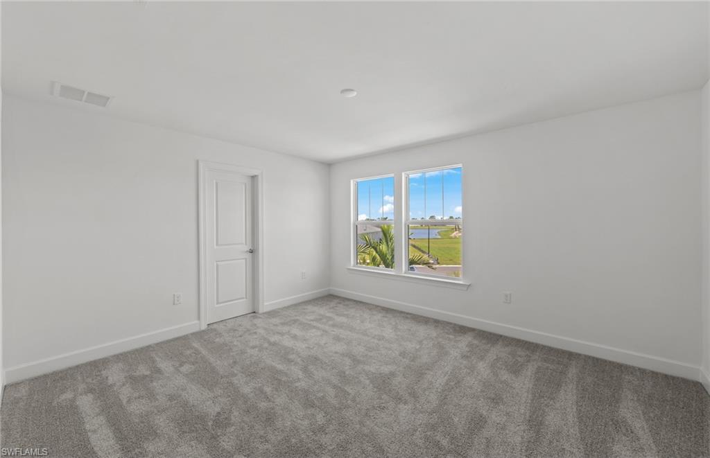 15629 Northridge Road Punta Gorda, FL 33982 - Photo 17 of 26 a view of an empty room with a window