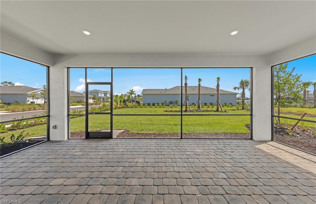 15629 Northridge Road Punta Gorda, FL 33982 - Photo 24 of 26 a view of a room with wooden floor