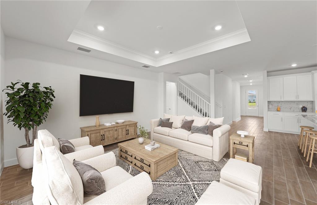 15629 Northridge Road Punta Gorda, FL 33982 - Photo 3 of 26 a living room with furniture and a flat screen tv